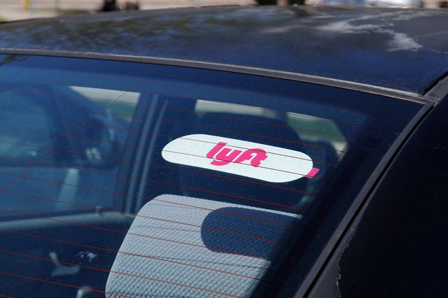 A car for hire with a Lyft sticker.